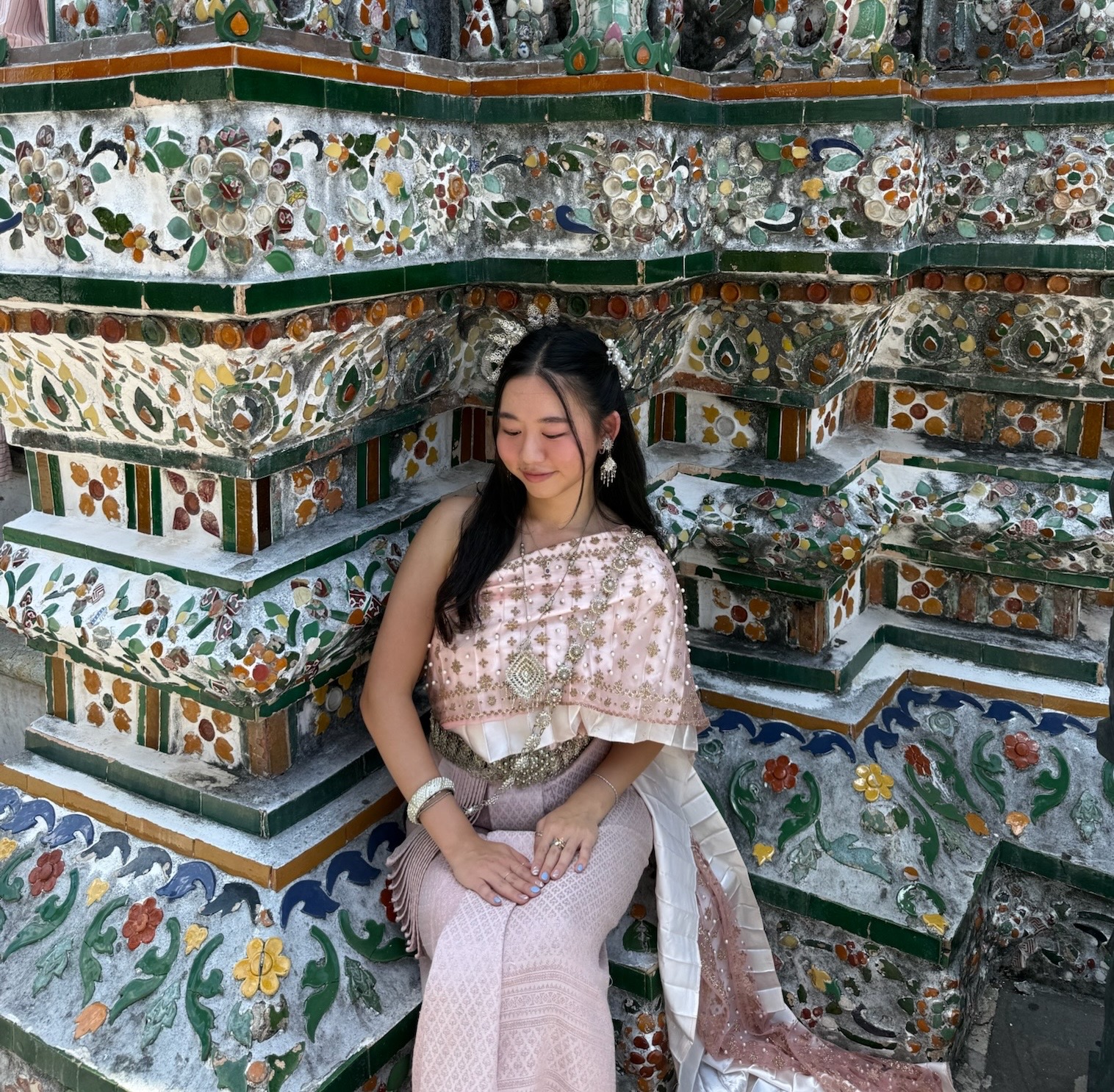 An outfit selfie of Joyce and her friend in traditional Thai clothing