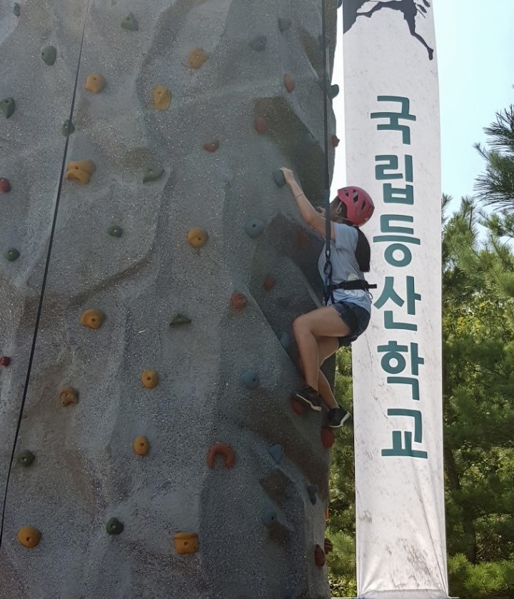 Joyce rock climbing at the National Climbing School in Seoraksan, South Korea